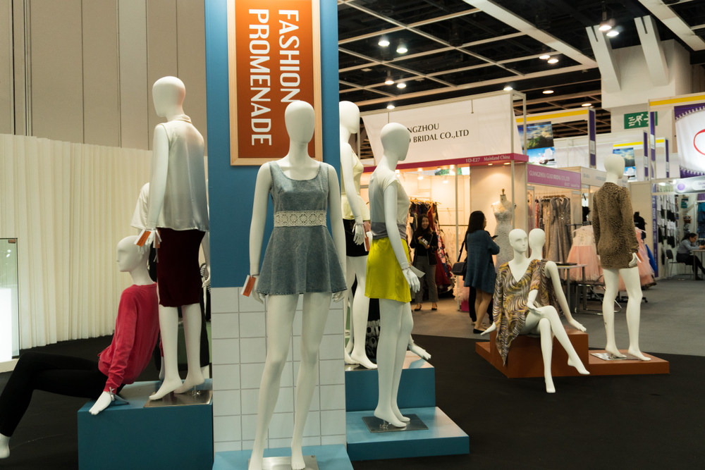 Wan Chai, Hong Kong - January 14, 2019 ; Business Buyers negotiate trade with seller exhibitors in Fashion Clothes Textile Design at HK Convention and Exhibition Center